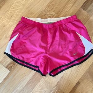 Nike Tempo womens small - hot pink with black and white accents.